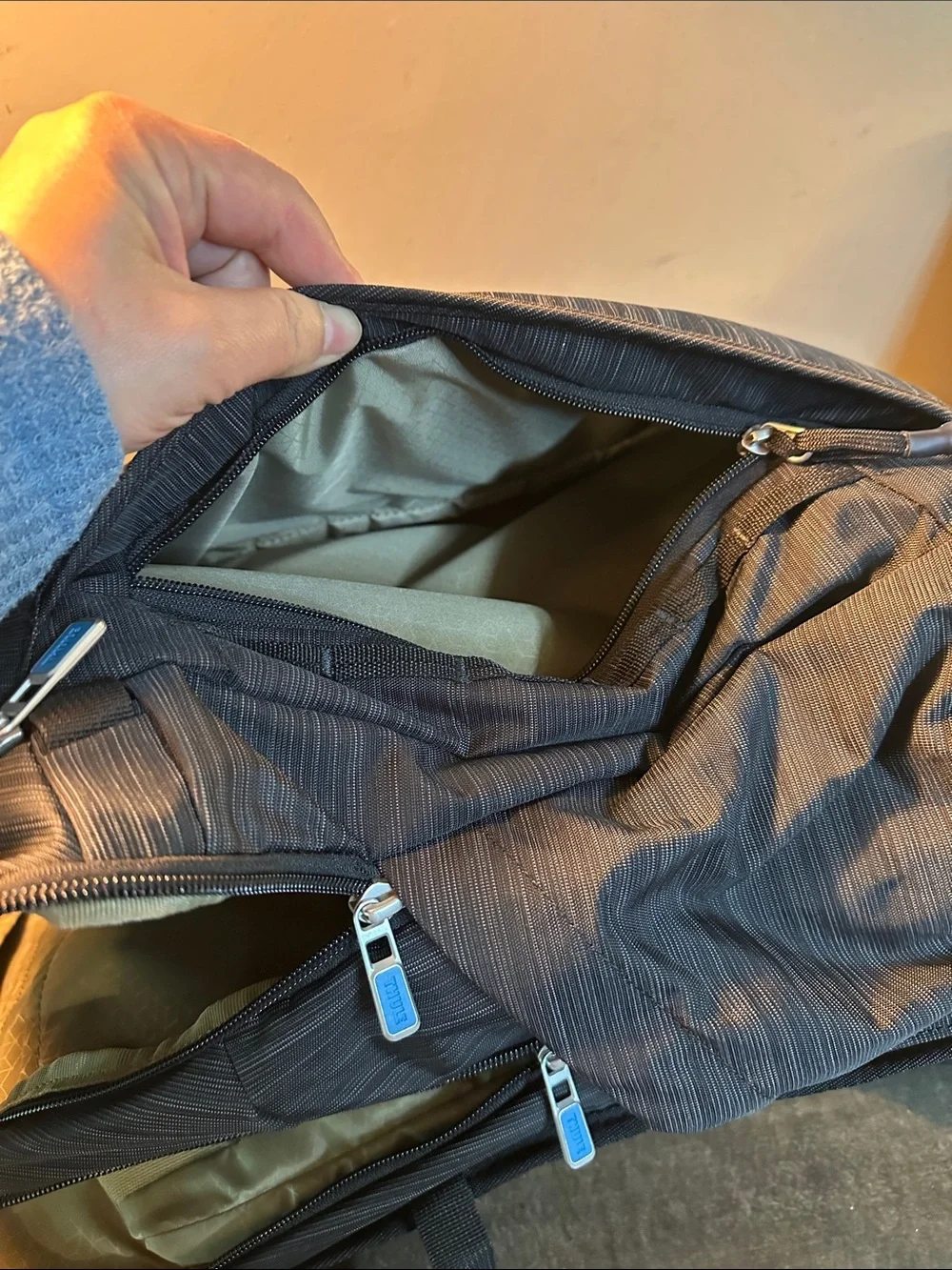 Thule Black Men's Commuter Backpack with Blue Zipper Accents